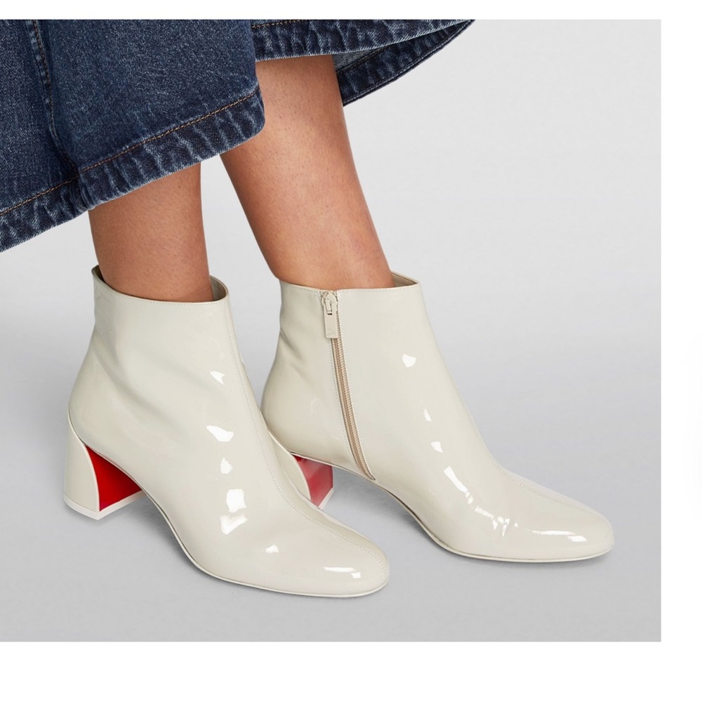 Christian Louboutin patent leather bootie. These are all out of stock 😊